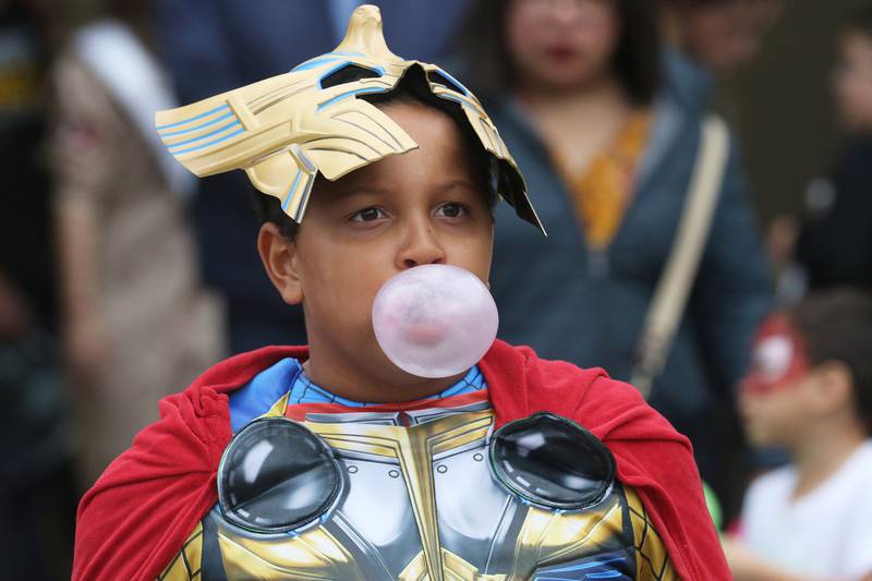 Tavin Newsome, 9, of Fox Lake blows a big bubble in a bubble gum bubble contest and takes 1st place during the Halloween Howl at the Village of Fox Lake Police Department.