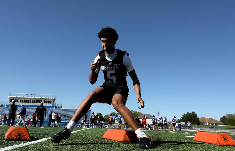 Huntley's Malik Carter runs an agility drill at the Northern Burbs Football Showcase on Monday, May 4, 2026, at Johnsburg High School. Over 165 players from 15 teams demonstrated their football skills to over 60 college coaches.