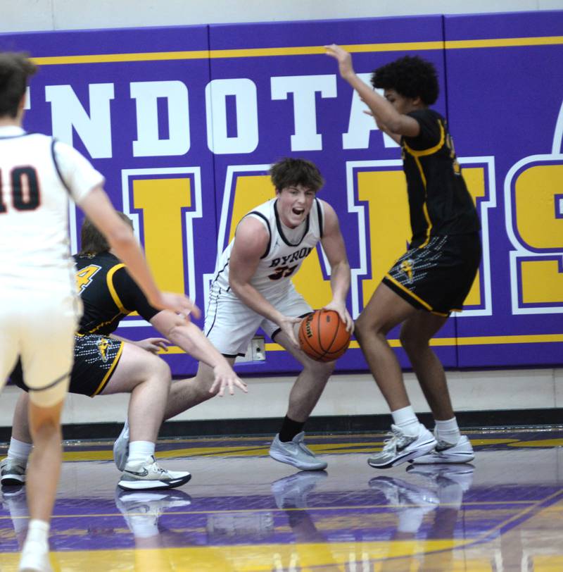 Byron's Caden Considine (33) looks to pass against Riverdale at the 2A Mendota Sectional on Wednesday, Feb. 28, 2024 at Mendota High School.