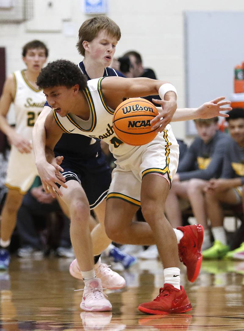 Crystal Lake South's Anthony Demirov tries to bring the ball up the court against Cary-Grove's AJ Berndt during the IHSA Class 3A Prairie Ridge Regional championship basketball game on Friday, Feb. 28, 2025, at Prairie Ridge High School in Crystal Lake.