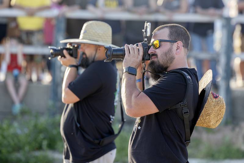 Dan Oaks (right) of Bradford, Pa., grabs some images Thursday, June 19, 2025, during the burnout show in Rock Falls.