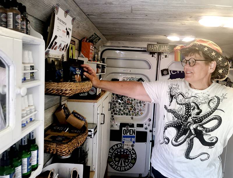 CBD-infused pet treats for cats and dogs are just some of the products Stacy McCaskill of Hempstock Pharm outside of Woodstock sold at the McHenry County Fair on Aug. 6, 2022.