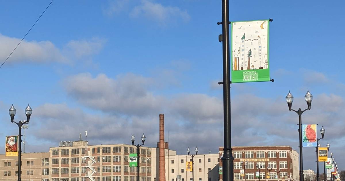 Woodlawn Arts Academy holiday art banners adorn Sterling bridge Shaw