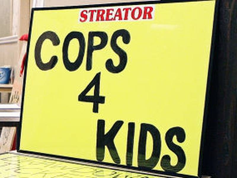 Streator Cops for Kids recently held an auction in the Knights of Columbus Hall.