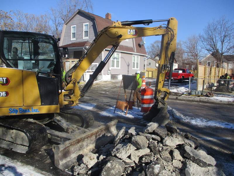 A construction crew continued work last week on a water main project on Center Street in Joliet that was started last year. Jan. 23, 2025