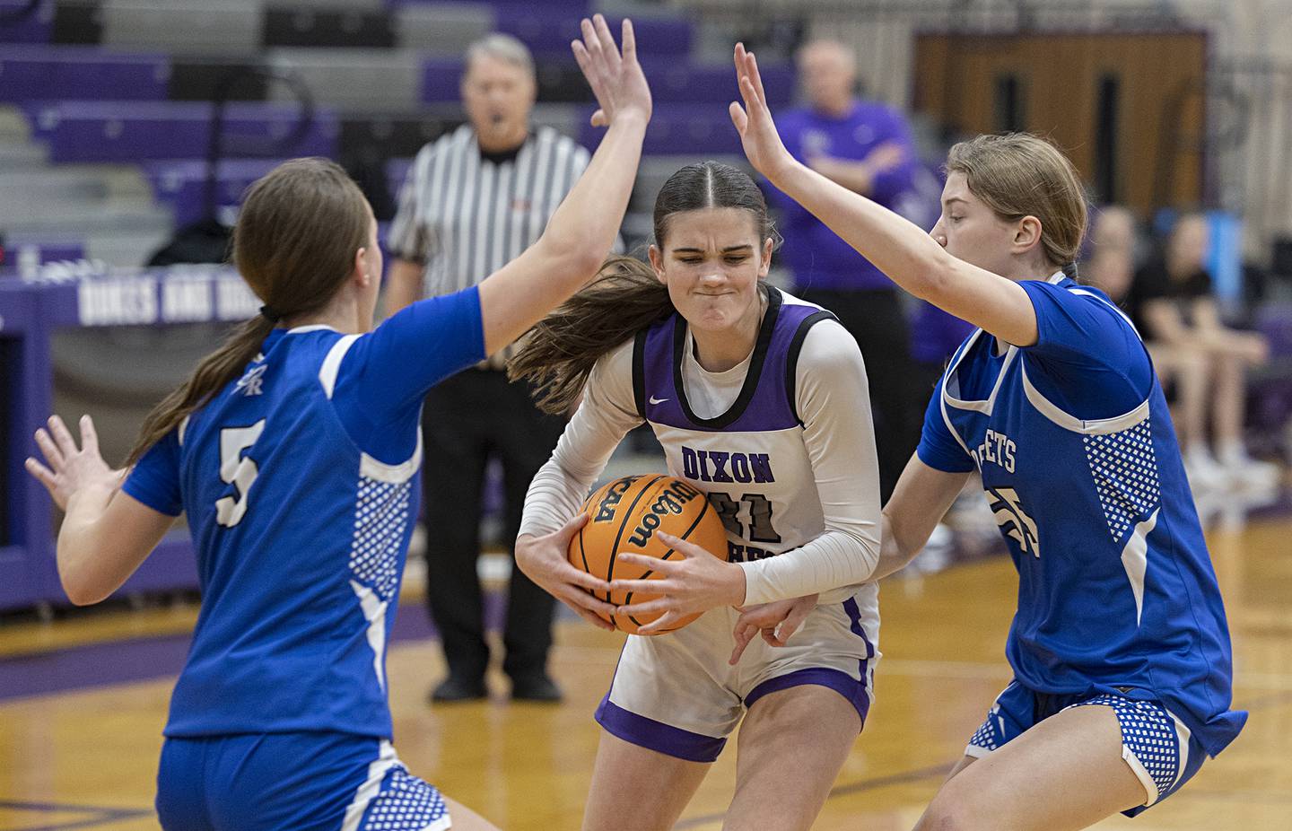 Dixon’s Kiley Gaither drives the lane against Burlington Central Friday, Dec. 26, 2025, at the Duchesses Basketball Christmas Classic.