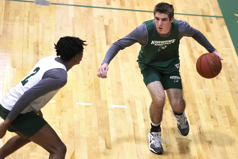 Former Indian Creek High School basketball player Cam Russell, now at Kishwaukee College, brings the ball up the court during practice Wednesday, Jan. 11, 2023, at the school.