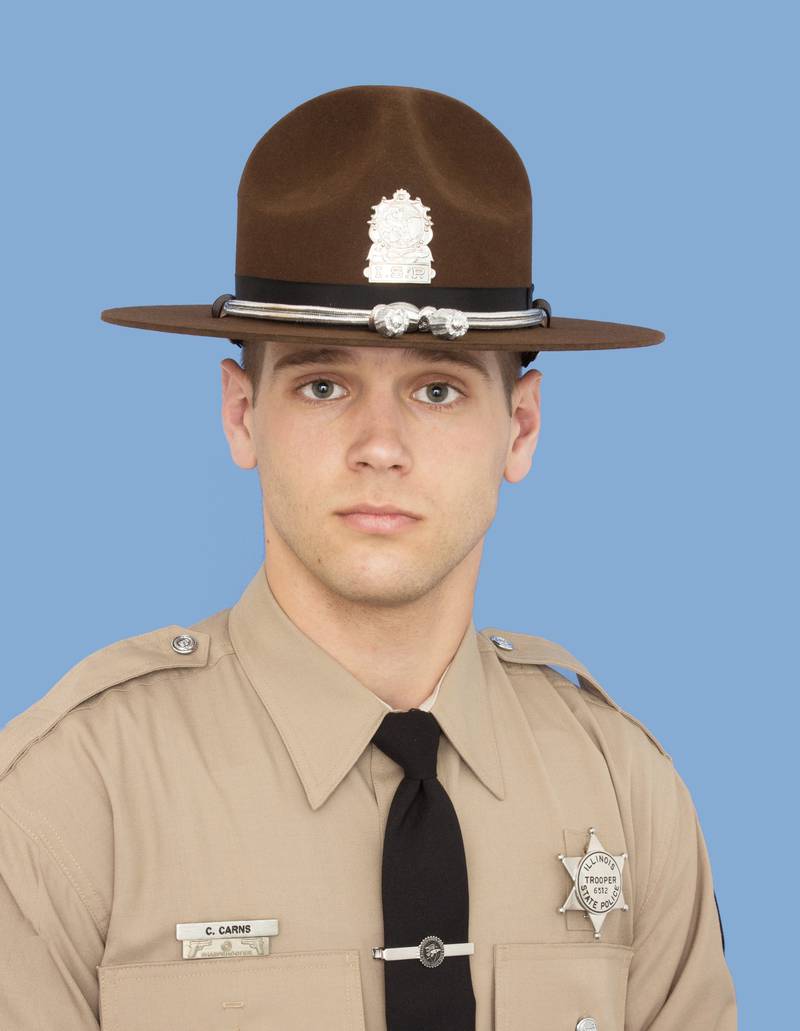 Illinois State Trooper Clay M. Carns died from injuries he sustained after being struck by a vehicle along Interstate 55 near Channahon Monday, Dec. 23, 2024.