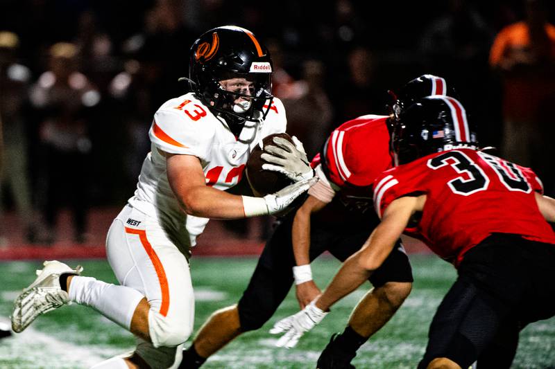 Lincoln-Way West's Joey Campagna pushes through the Central defense during a game on Friday Sept. 15, 2023 at Lincoln-Way Central High School in New Lenox