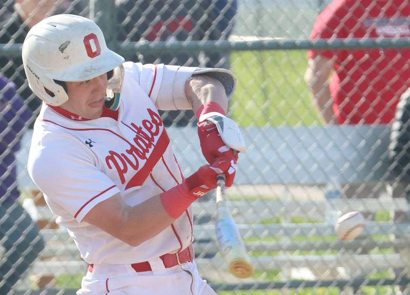 Ottawa's Adam Swanson makes contact with the ball against Morris on Monday, April 20, 2026 at Ottawa High School.