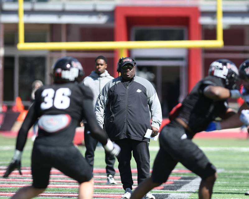 Northern Illinois University head coach Thomas Hammock looks on during a spring scrimmage held on Saturday April 16th at Huskie Stadium in DeKalb.