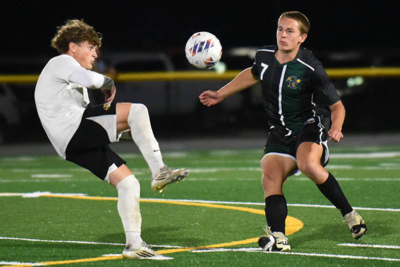Coal City's Aidan Kenney, right, looks to block a pass from Herscher's Jacob Benoit during a game at Coal City Thursday, Oct. 2, 2025.