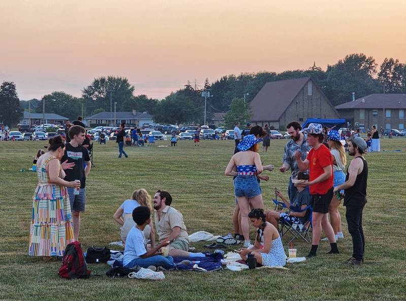 Community members gathered on blankets and chairs throughout the park to enjoy the July 4th fun.