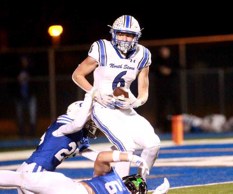 St. Charles North’s Keaton Reinke carries the ball into the endzone for a touchdown on Friday, Oct. 25, 2024 during a game at Geneva.