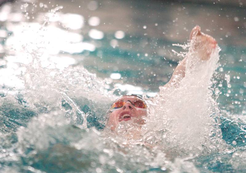 Drew Watson of Cary-Grove co-op swims the 200-Yard Individual Medley during the Fox Valley Conference Swimming Championships at Woodstock North High School Saturday.