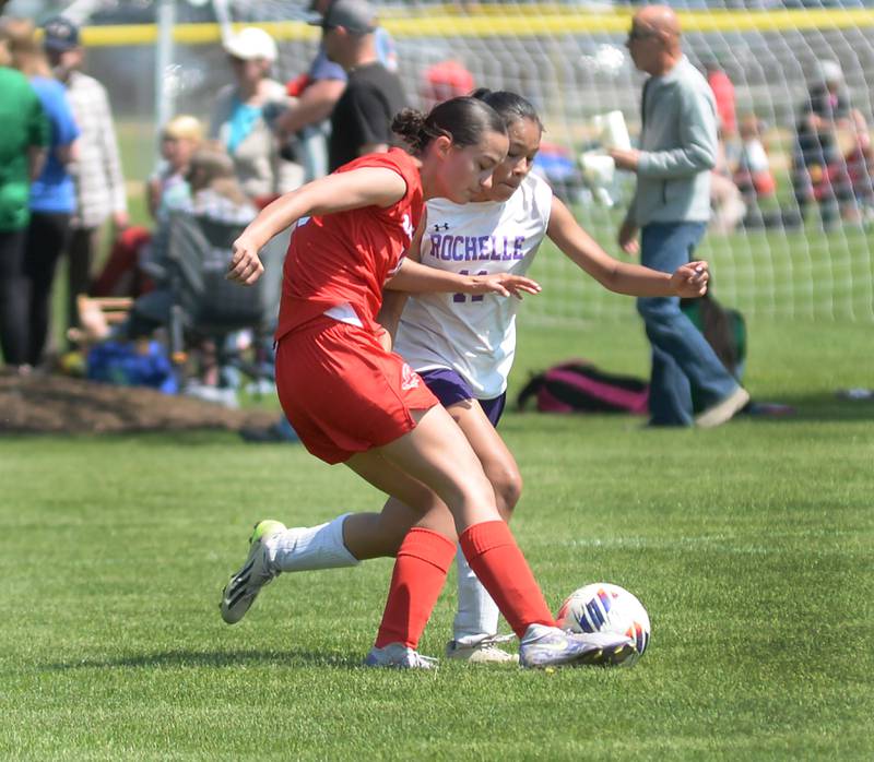 Oregon's Sarah Eckardt (13) and Rochelle's Martha Landa battle for the ball during a Saturday, May 10, 2025 at Oregon Park West.