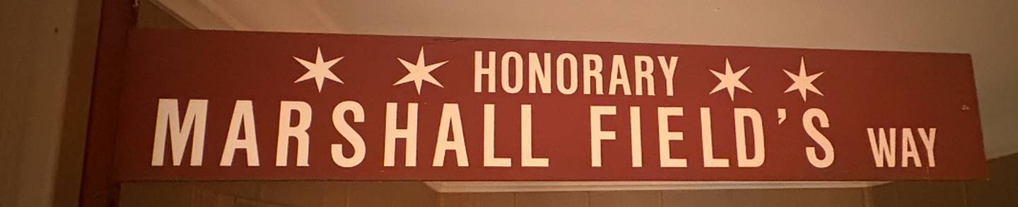 Pieces of Marshall Field's memorabilia include an honorary street sign.