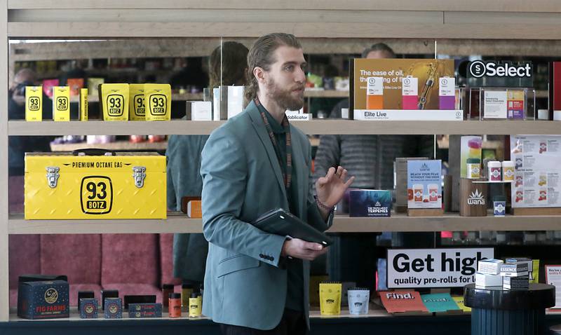 Zachary Edgerton, the general manager of the Ivy Hall Crystal Lake, gives a tour during an open house Thursday, Feb. 2, 2023, at the social equity-licensed marijuana dispensary that recently opened at 501 Pingree Road in Crystal Lake.