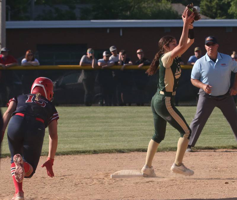 St. Bede's Lily Bosnich forces out Biggsville's Lauren Winters after being caught at second base in the Class 3A Sectional championship game on Friday, May 26, 2023 at St. Bede Academy.