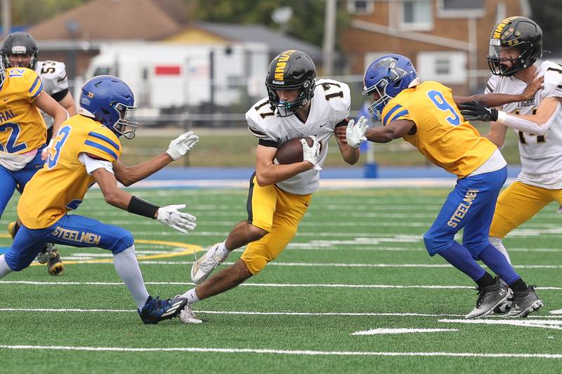 Joliet West’s Owen Barton makes a move after a catch against Joliet Central on Saturday, Sept. 28, 2024 in Joliet.