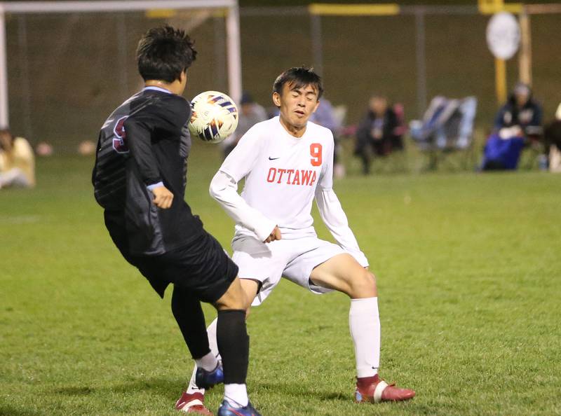 Ottawa's Jaickob Pastor Ortiz avoids the header with Kankakee's Joseph Andrade during the Class 2A Regional semifinal game on Monday, Oct. 20, 2025 at Ottawa HIgh School.