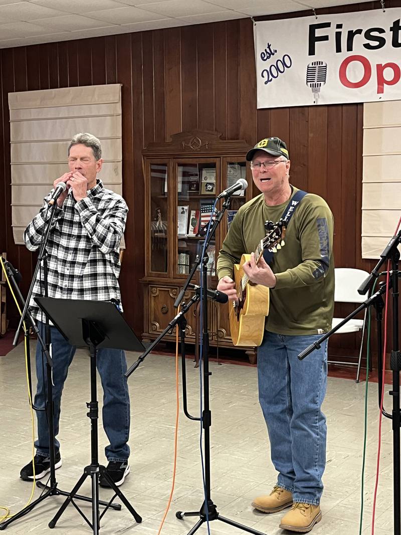 Kevin O’Neil, on the left, and Greg Crull, on the right, appeared at last month’s First Fridays Open Mic. They are half of the popular local band known as Well Strung.