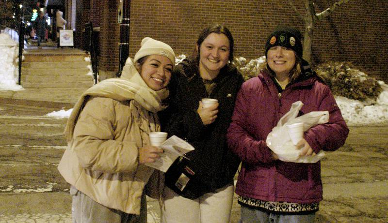 Three cold shoppers stop for the camera during Sterling's Sights and Sounds kickoff to the holiday season. The event in downtown Sterling was held on Friday, December 5, 2025.