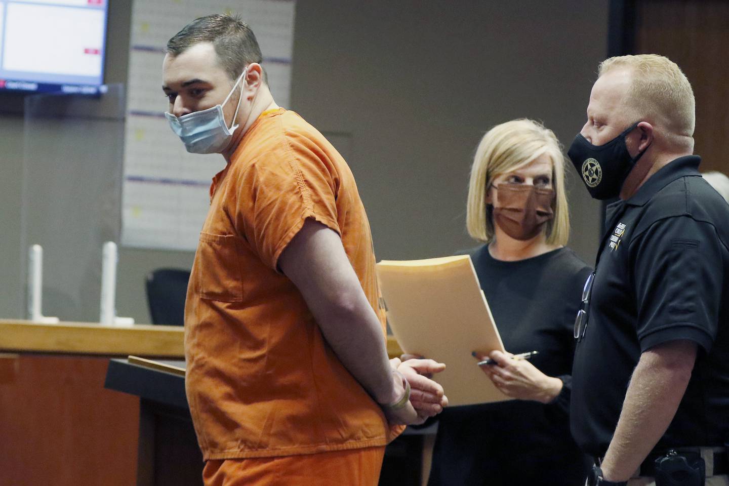 Jonathan Van Duyn is led out of Judge Robert Wilbrandt's courtroom on Thursday, May 27, 2021, at the Michael J. Sullivan Judicial Center in Woodstock.