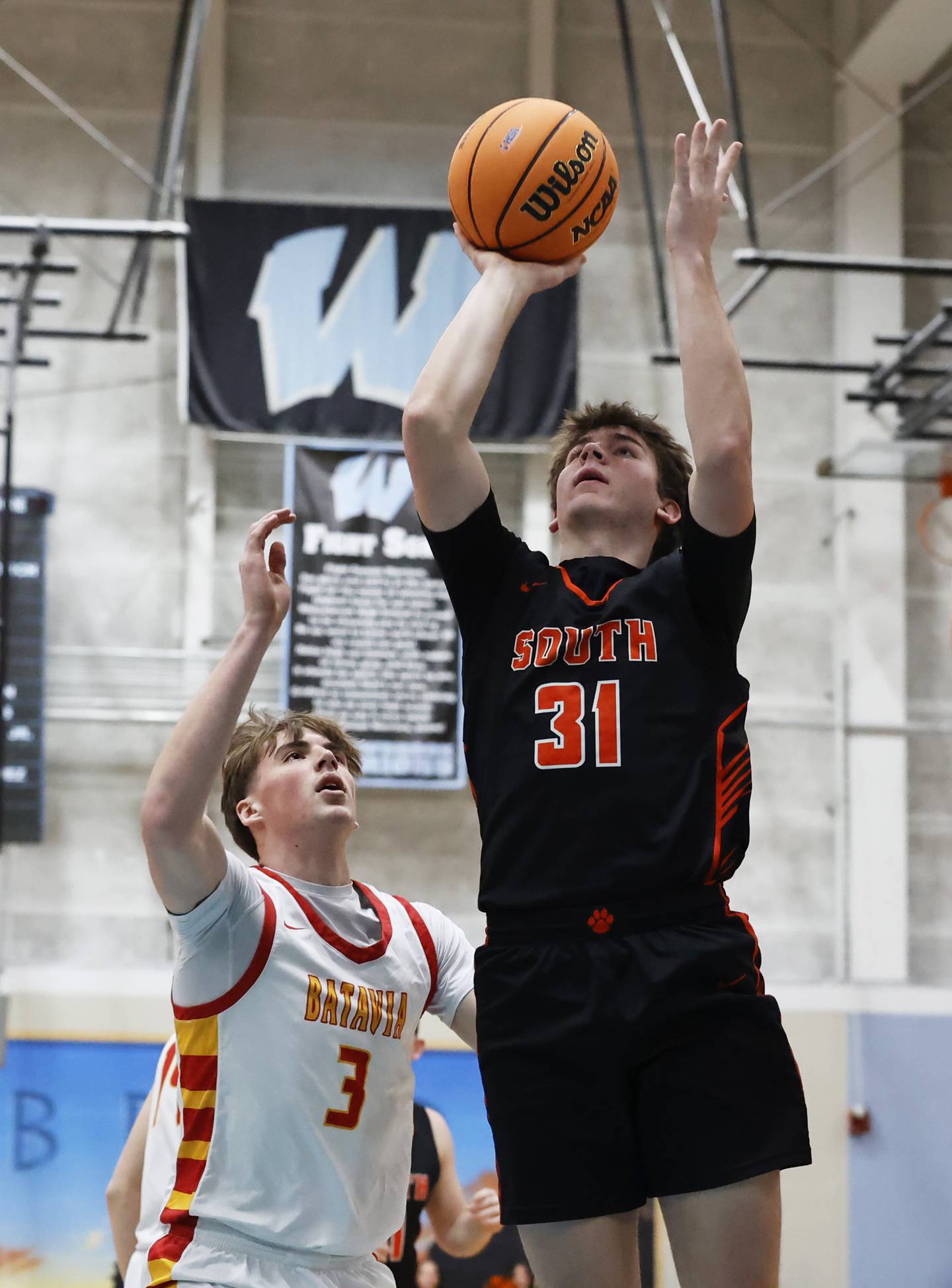 Wheaton Warrenville South's AJ Rogers (31) puts up a shot during the IHSA boys class 4A Willowbrook regional final between Wheaton Warrenville South and Batavia on Friday, Feb. 27, 2026 in Villa Park, IL.