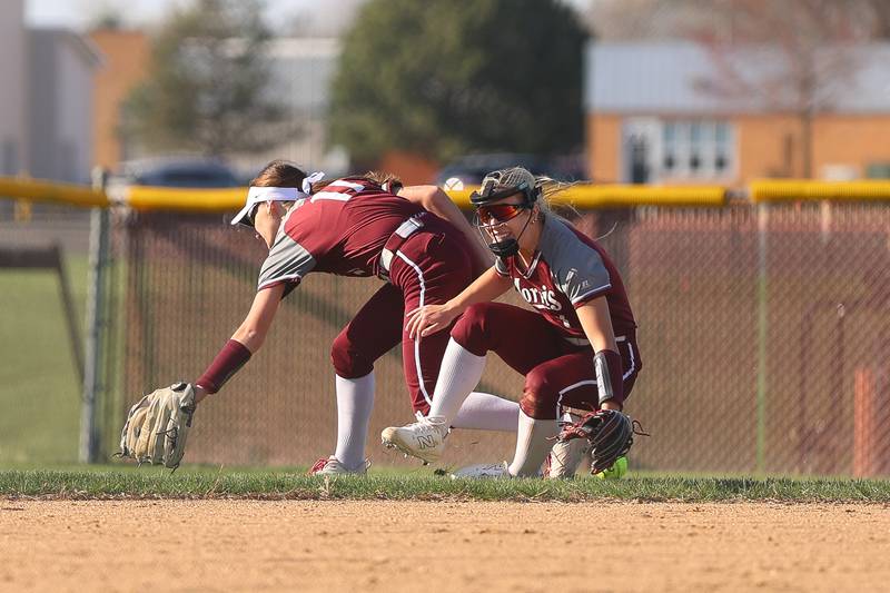 Morris’ Ella Urbasek (11) and Halie Olson collide tryin to field the ball against Ottawa on Wednesday, April 8, 2026 in Morris.
