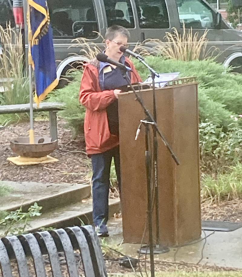 Terry Johnson introduced Mitch McCoy as the recipient of the Quilt of Valor during Monday's 9-11 Remembrance Ceremony, at Soldiers and Sailors Park in Princeton.