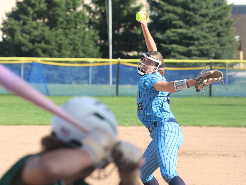 Marquette pitcher Kinley Rick lets go of a throw to St. Bede on Tuesday, April 23, 2026 at June Cross Field in Ottawa.