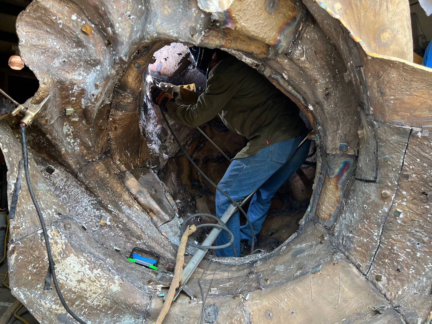 Crystal Lake-based artist Erik Blome welded pieces of the bronze DuSable sculpture from the inside at his Woodstock studio.