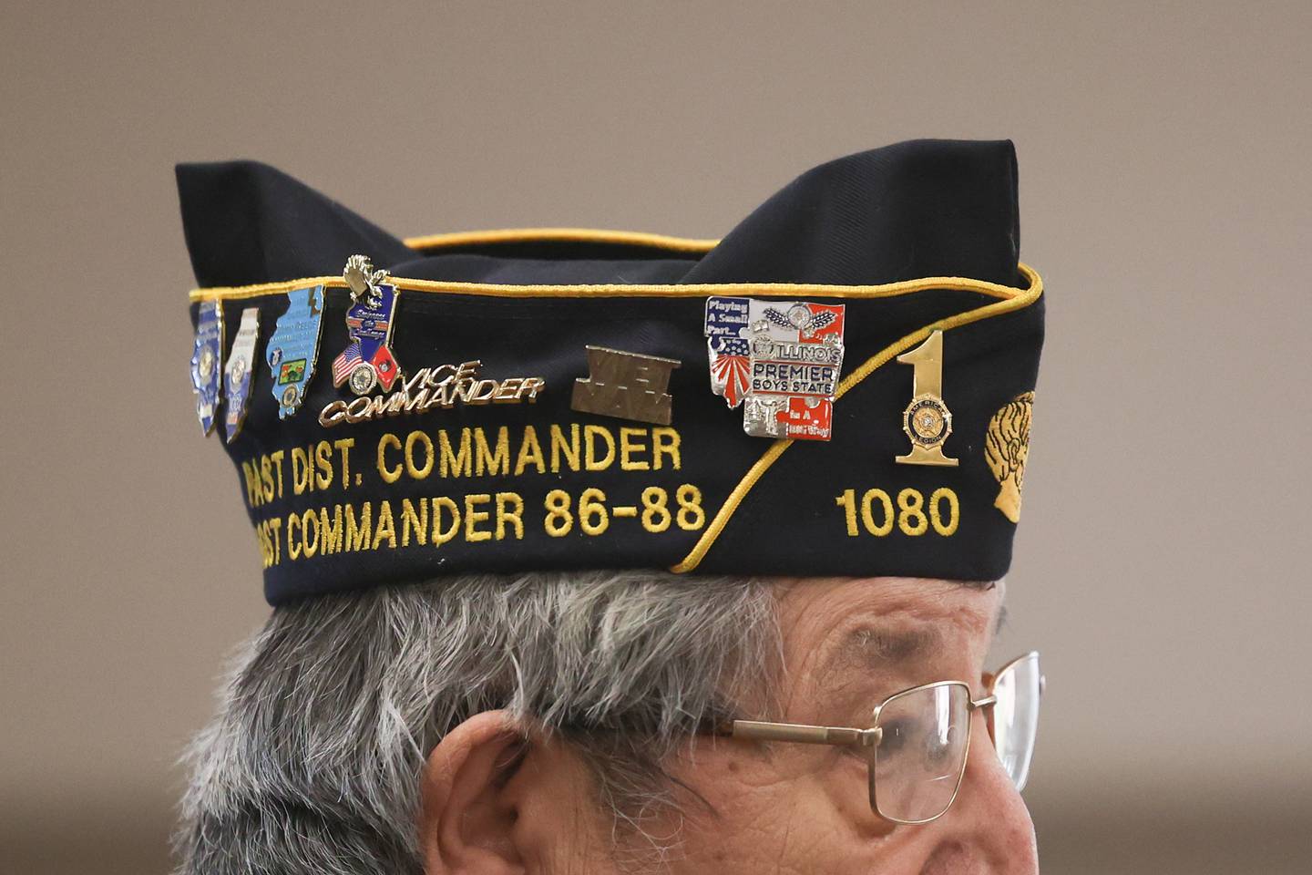Tony Arellano, Senior Vice-Commander, wears his post 1080 hat during the Veterans Day service at the American Legion Post 1080 in Joliet on Friday.