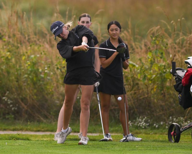 Paige Flanigan of Geneva tees off during the DuKane conference meet on Tuesday Sept. 23, 2025, held at Phillips golf course in Aurora.