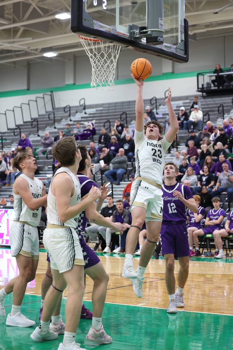Bishop McNamara's Karter Krutsinger shoots after a rebound during the Fightin' Irish's 61-24 victory over Wilmington in the IHSA Class 2A Seneca Sectional semifinal on Tuesday, March 3, 2026.
