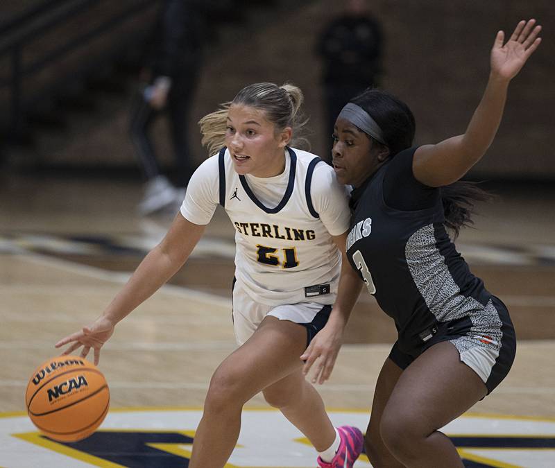 Sterling’s Jaelynn James dribbles against Galesburg’s  Khloe May Thursday, Dec. 4, 2025.
