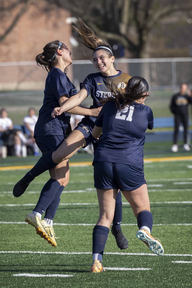 Sterling’s Sophia Georgieva leaps into her teammates after scoring a goal against Mendota Wednesday, April 8, 2026.