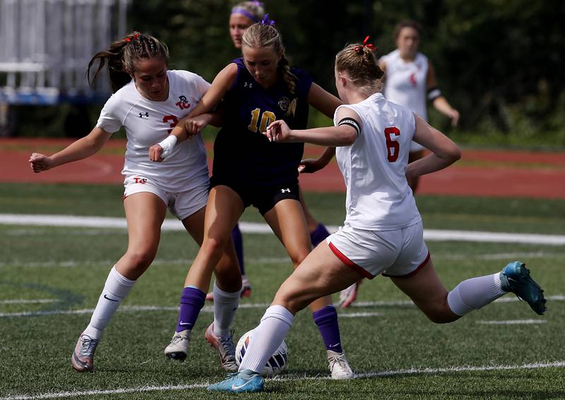 Timothy Christian's Kate Gagliano (left) and Mia Schilf (left) defend Williamsville's Ella Plumb in the IHSA Class 1A State Girls Soccer third-place match on Friday, June 6, 2025, at North Central College in Naperville.