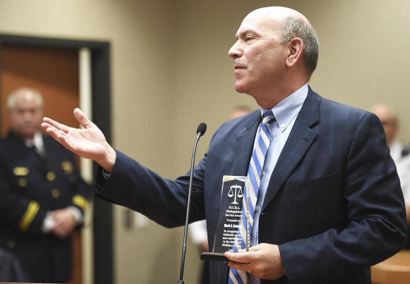 Attorney Mark Saladin thanks family and colleagues Friday for the Distinguished Service Award he received as part of Law Day at the McHenry County Courthouse. Saladin serves on the Woodstock City Council and volunteers in many aspects of the community.