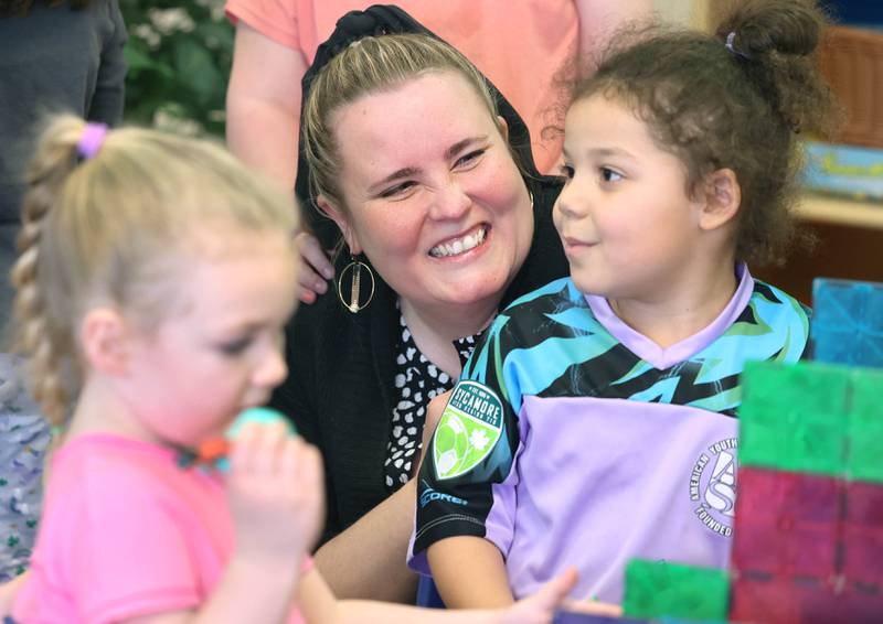 Laurel Copeland, Little Spartans Early Learning Program teacher at South Prairie Elementary School, has a laugh with Avery Anderson during class Wednesday, April 6, 2023, at the school in Sycamore.