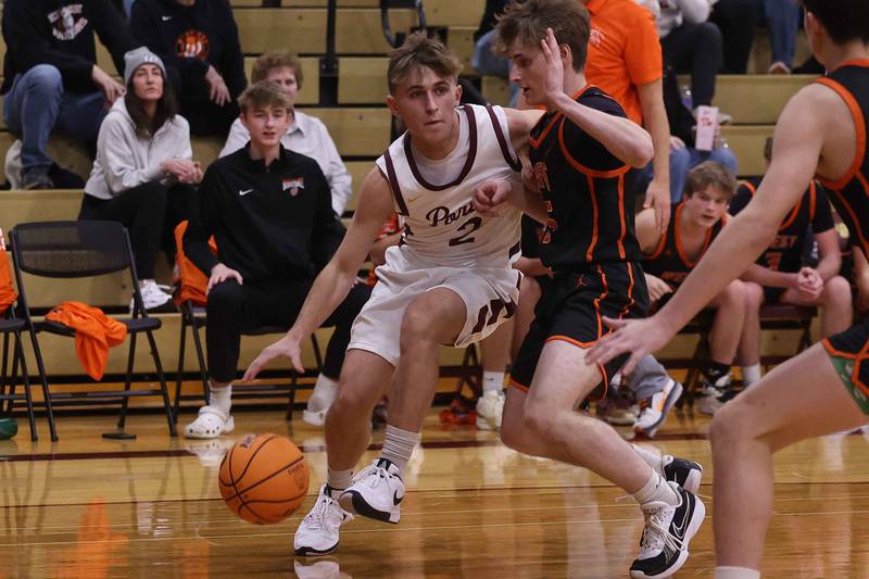 Lockport’s Bryce Turner drives along the baseline against Lincoln-Way West on Friday, Dec. 6, 2024 in Lockport.