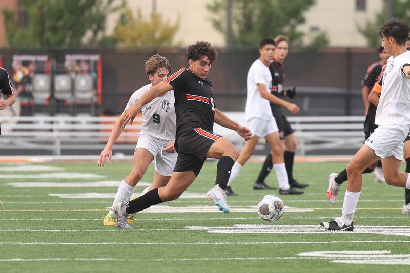 Plainfield East’s Ben Basta makes a play against Plainfield Central on Tuesday, Sept. 19, in Plainfield.