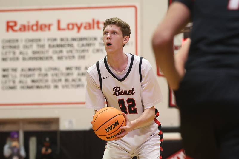 Benet’s Colin Stack lines up the outside shot against Bolingbrook in the Class 4A Bolingbrook Sectional championship game on Friday, March 6, 2026 in Bolingbrook.