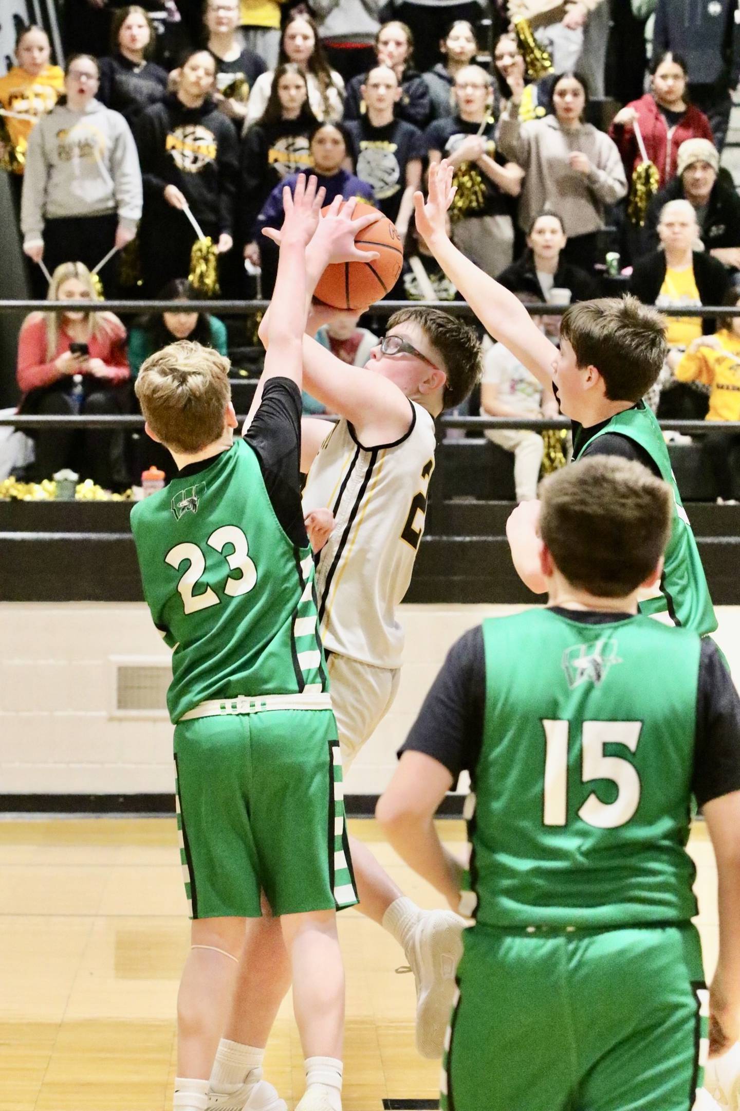PC's Marshall Holocker gets through traffic for a basket in Thursday's regional finals in McNabb.