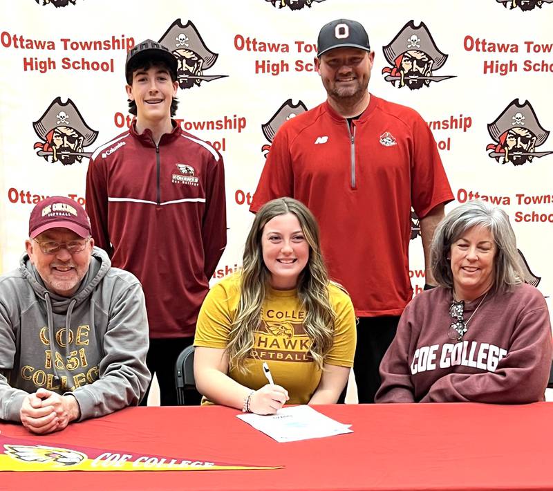 Ottawa’s Peyton Bryson has signed to continue her education at Coe College in Cedar Rapids, Iowa, and her softball career at the NCAA Division 3 level with the Kohawks. Bryson – a pitcher/first baseman for the Pirates and second-team member of the 2024 Times All-Area Softball Team – is pictured at her signing ceremony with her family and Ottawa softball coach Adam Lewis, back row on the right.
