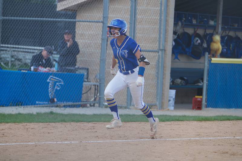 Wheaton North's Abby Del Preto heads for home after hitting a homer against Oswego on Tuesday May 6, 2025 in Wheaton.