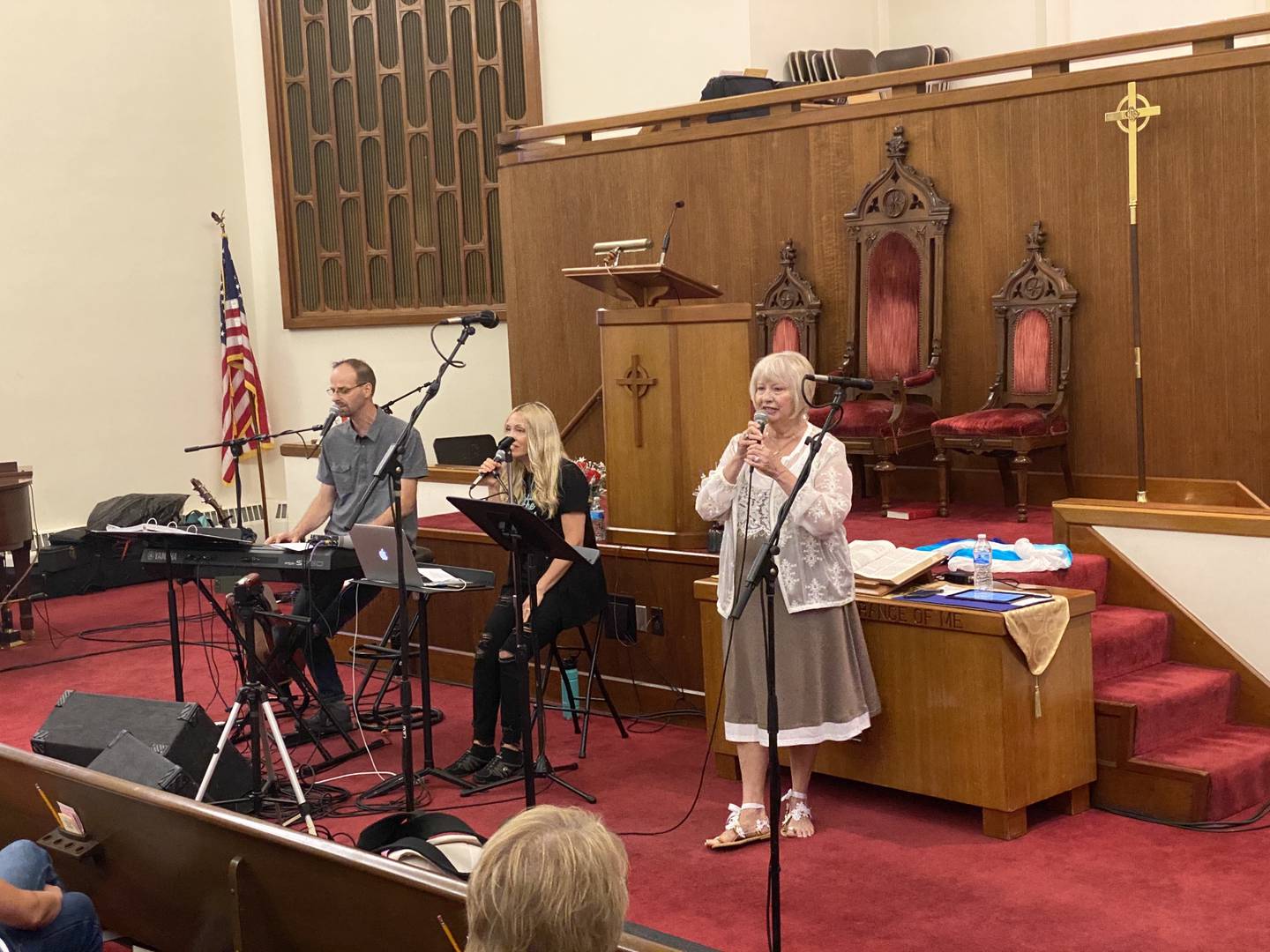 Brent and Michelle Mitchell sing with Judy Dagrette to open Praise in the Park on Friday, June 10, 2022, originally scheduled for Washington Square in Ottawa, but moved indoors to First Presbyterian Church because of rain.