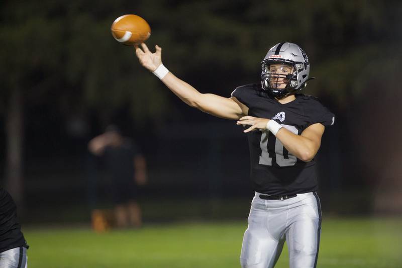 Kaneland's Troyer Carlson throws a pass against Ottawa on Friday, Sept. 22, 2023 in Maple Park.