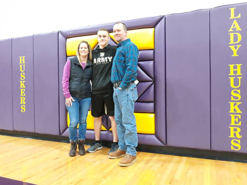 Trevor Thanepohn (center) poses for a photo with his parents Julie and Chad at Serena High School. Thanepohn was selected to be admitted to the U.S. Military Academy at West Point.
